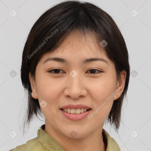 Joyful asian young-adult female with medium  brown hair and brown eyes