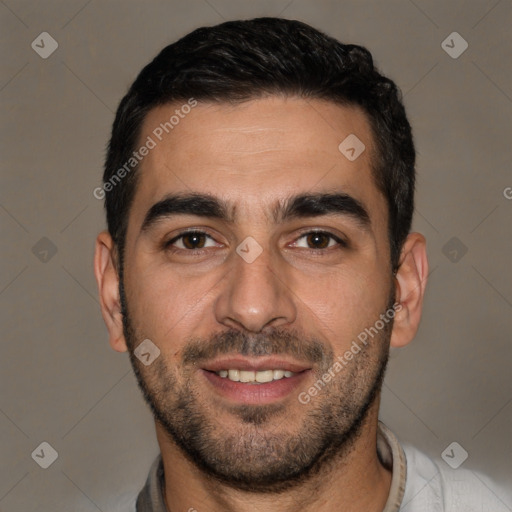 Joyful white young-adult male with short  black hair and brown eyes