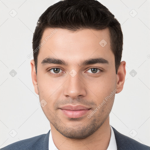 Neutral white young-adult male with short  black hair and brown eyes