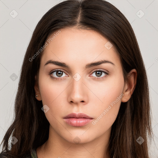 Neutral white young-adult female with long  brown hair and brown eyes