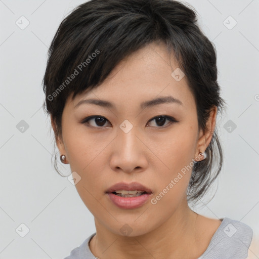 Neutral asian young-adult female with medium  black hair and brown eyes