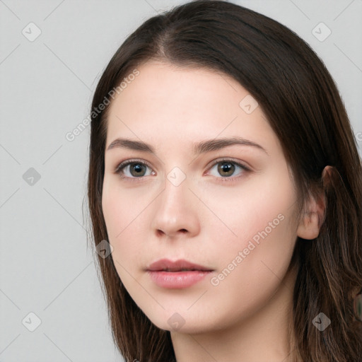 Neutral white young-adult female with long  brown hair and brown eyes