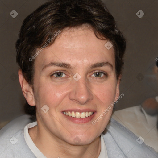 Joyful white adult female with short  brown hair and brown eyes