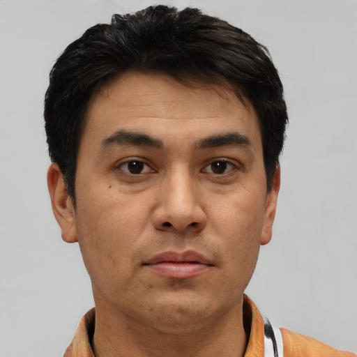 Neutral white young-adult male with short  black hair and brown eyes