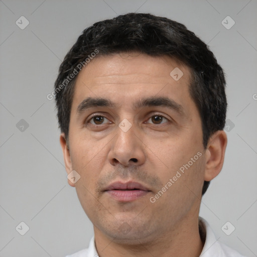 Neutral white adult male with short  black hair and brown eyes