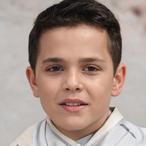 Joyful white child male with short  brown hair and brown eyes