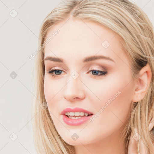 Joyful white young-adult female with long  brown hair and blue eyes