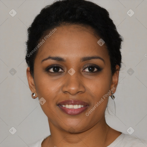 Joyful black young-adult female with short  black hair and brown eyes