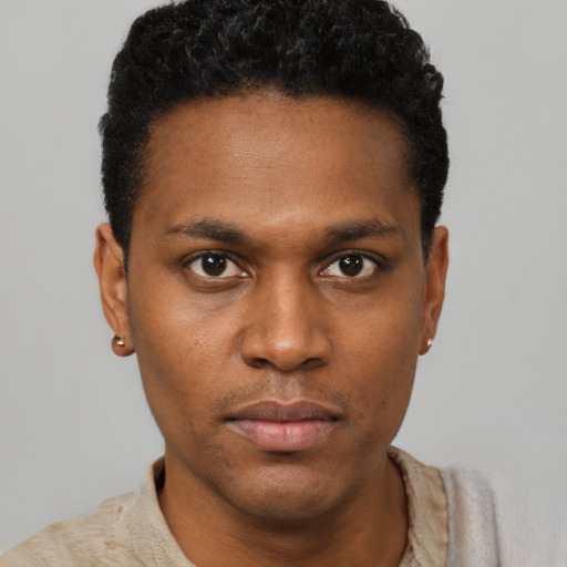 Neutral black young-adult male with short  black hair and brown eyes