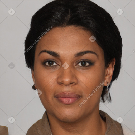 Joyful black young-adult female with short  black hair and brown eyes
