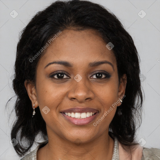 Joyful black young-adult female with medium  brown hair and brown eyes