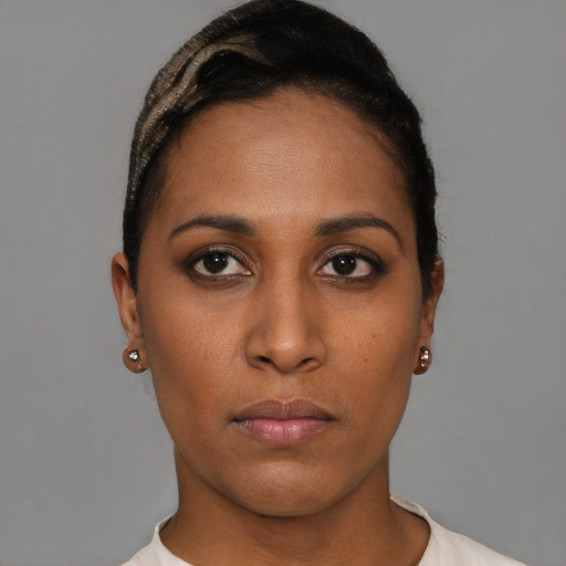 Neutral black young-adult female with short  brown hair and brown eyes