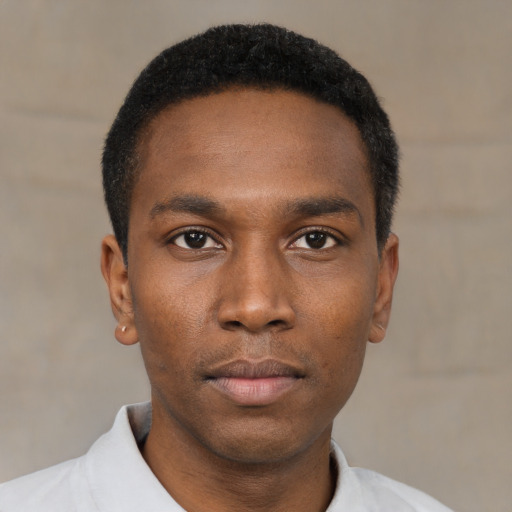 Neutral black young-adult male with short  black hair and brown eyes