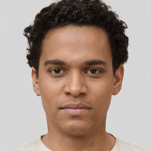 Neutral black young-adult male with short  brown hair and brown eyes