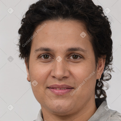 Joyful white adult female with short  brown hair and brown eyes