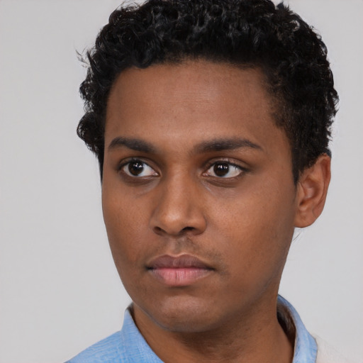 Neutral black young-adult male with short  brown hair and brown eyes