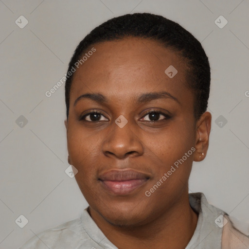 Joyful black young-adult female with short  black hair and brown eyes