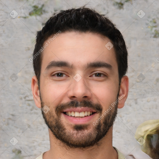 Joyful white young-adult male with short  black hair and brown eyes