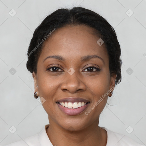 Joyful black young-adult female with short  black hair and brown eyes