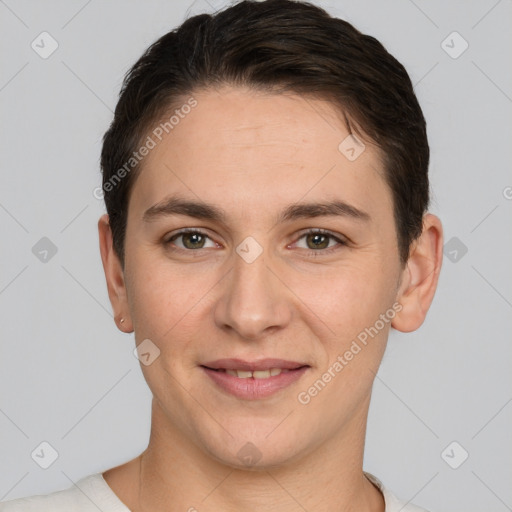 Joyful white young-adult female with short  brown hair and brown eyes