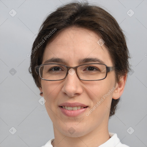 Joyful white adult female with short  brown hair and brown eyes