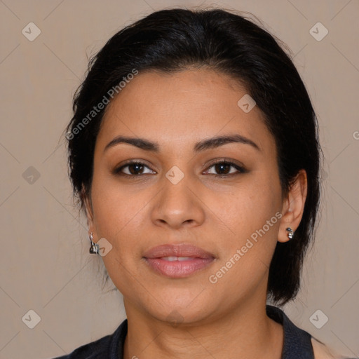 Joyful latino young-adult female with medium  brown hair and brown eyes