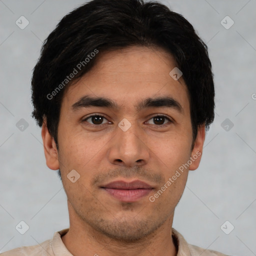 Joyful white young-adult male with short  black hair and brown eyes