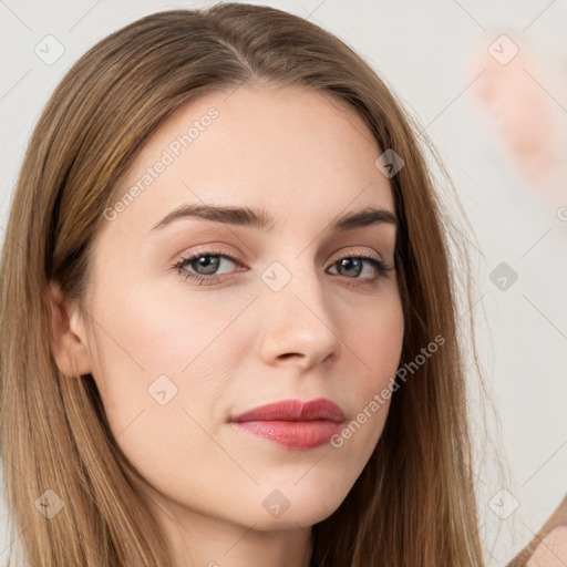 Neutral white young-adult female with long  brown hair and brown eyes