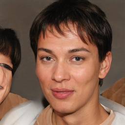 Joyful white adult female with medium  brown hair and brown eyes