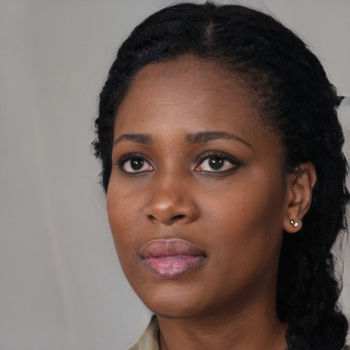 Neutral black young-adult female with long  black hair and brown eyes