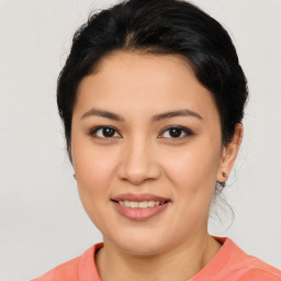 Joyful asian young-adult female with short  brown hair and brown eyes