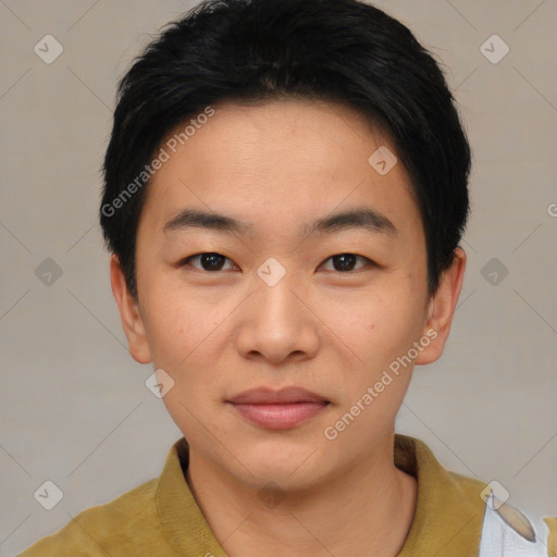 Joyful asian young-adult male with short  black hair and brown eyes