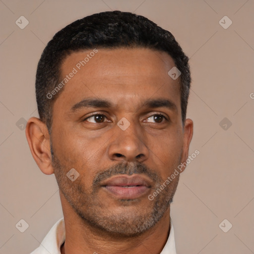 Neutral latino young-adult male with short  brown hair and brown eyes