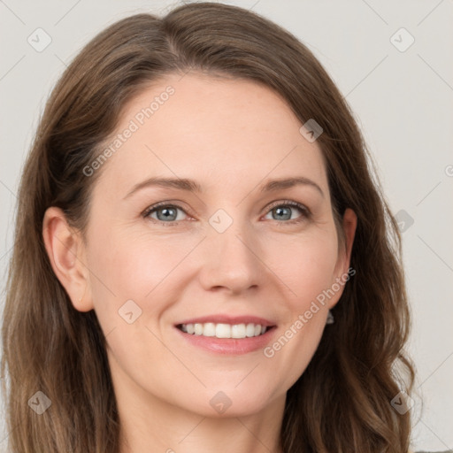 Joyful white young-adult female with long  brown hair and blue eyes