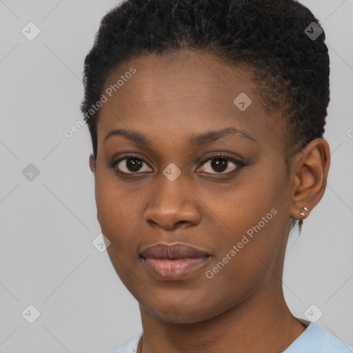 Joyful black young-adult female with short  brown hair and brown eyes