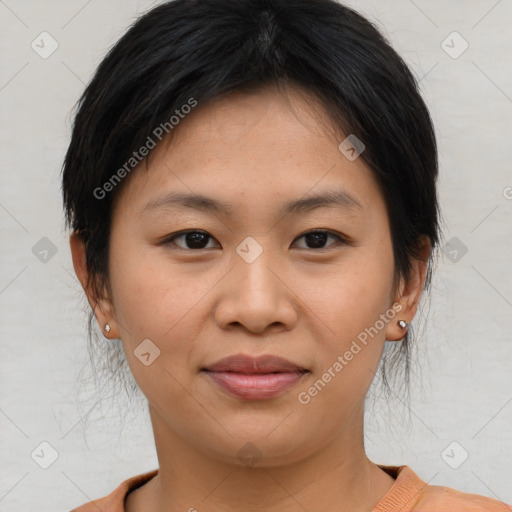 Joyful asian young-adult female with short  brown hair and brown eyes