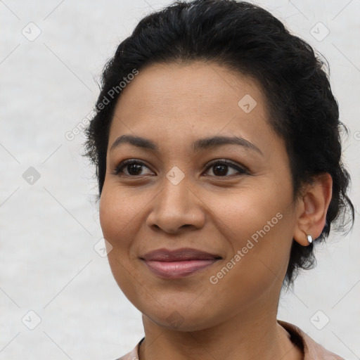 Joyful latino young-adult female with medium  brown hair and brown eyes