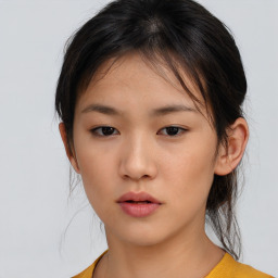 Neutral asian young-adult female with medium  brown hair and brown eyes