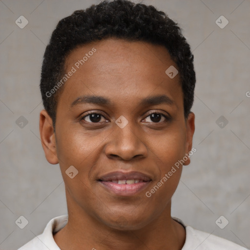 Joyful black young-adult male with short  brown hair and brown eyes