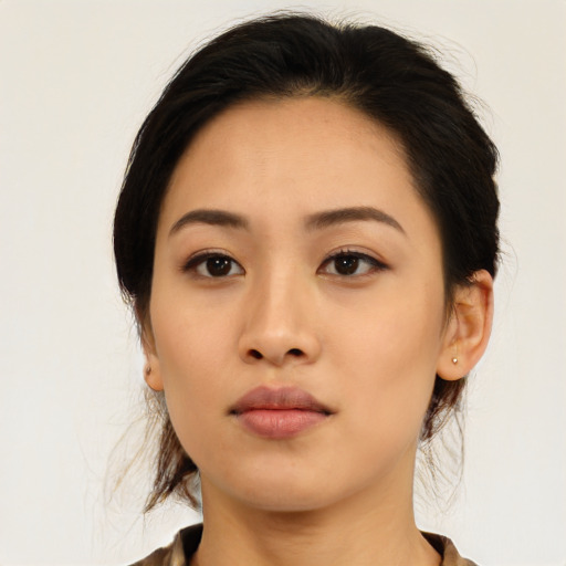 Neutral asian young-adult female with medium  black hair and brown eyes