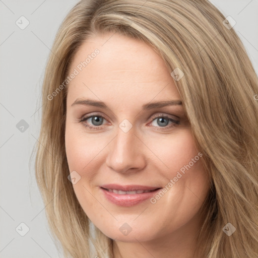 Joyful white adult female with long  brown hair and brown eyes