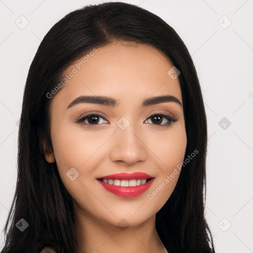 Joyful latino young-adult female with long  black hair and brown eyes