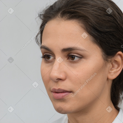 Neutral white young-adult female with medium  brown hair and brown eyes