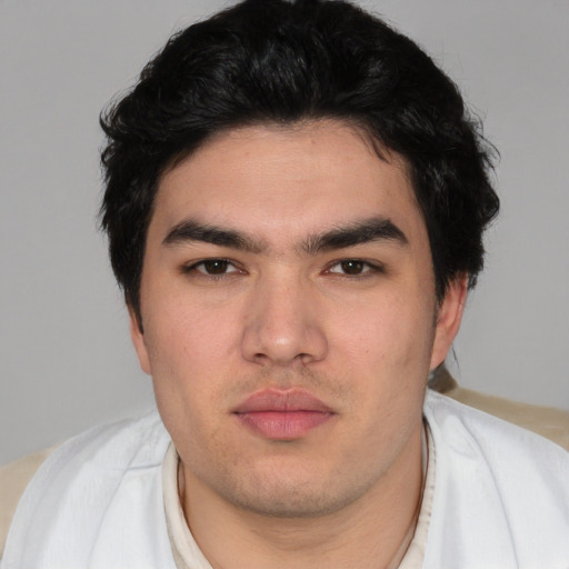 Neutral white young-adult male with short  black hair and brown eyes