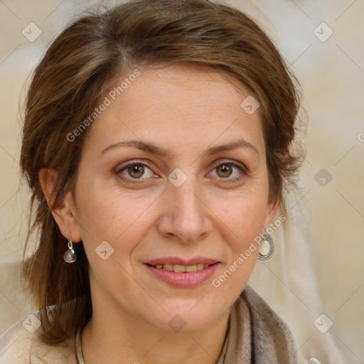 Joyful white adult female with medium  brown hair and grey eyes