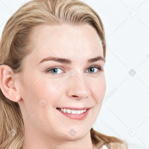 Joyful white young-adult female with long  brown hair and blue eyes