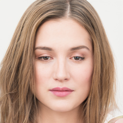 Joyful white young-adult female with long  brown hair and green eyes