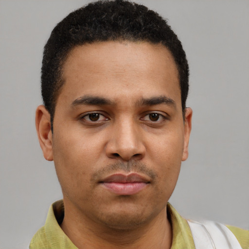 Neutral latino young-adult male with short  brown hair and brown eyes