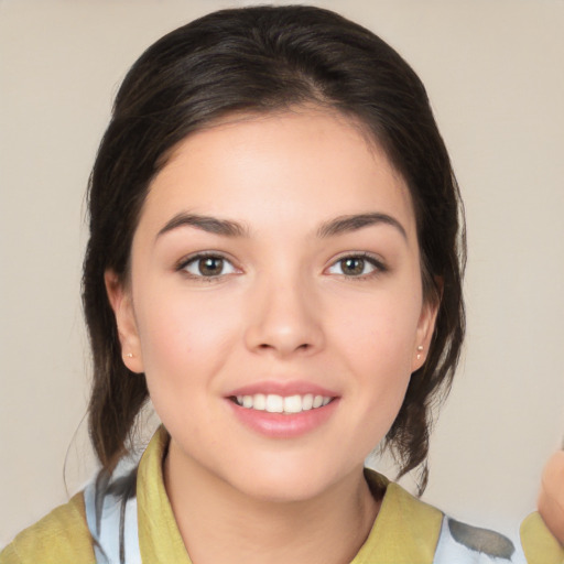 Joyful white young-adult female with medium  brown hair and brown eyes