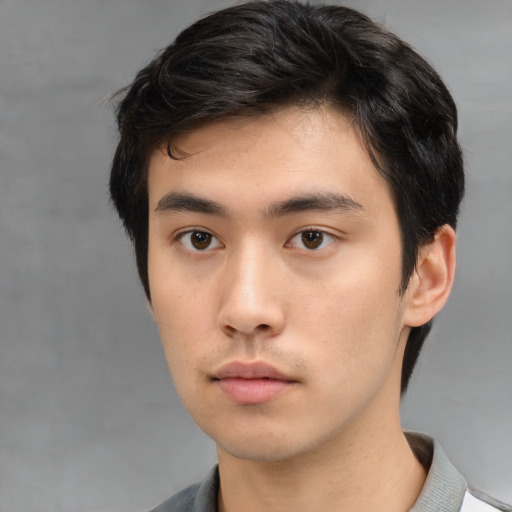 Neutral asian young-adult male with short  brown hair and brown eyes